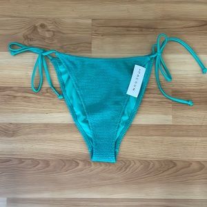 Kendall and Kylie green swimsuit bottoms